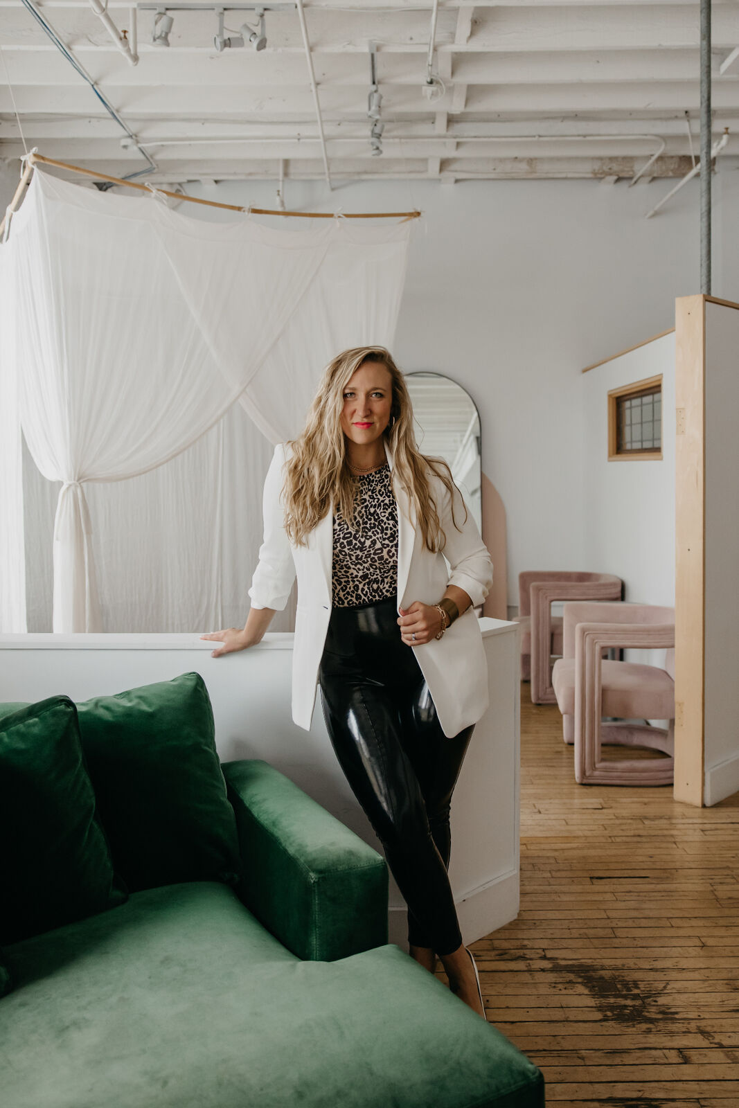Dr. Mel Krug in a white blazer — transformational coach for entrepreneurs and leaders