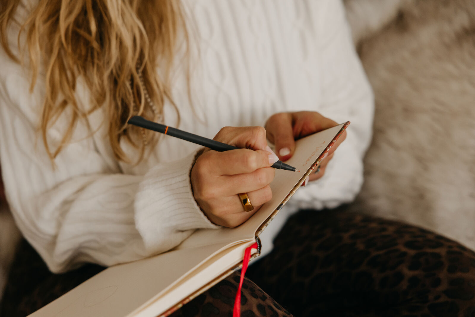 Dr. Mel Krug writing in her journal — integrating somatic healing into daily life